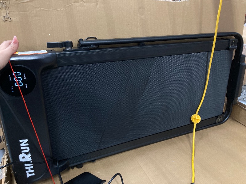 Photo 1 of **FAULTY SAFETY CLIP**
DAMAGE TO CORD
THERUN Walking Pad, 2 in 1 Foldable Treadmills for Home, 2.5HP Under Desk with Handle Bar, 16" Widened Running Belt, with Remote Control