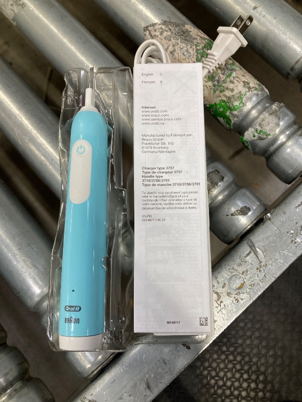 Photo 1 of **CHARGER AND TOOTHBRUSH ONLY****Oral-B Pro 1000 Rechargeable Electric Toothbrush, Turquoise