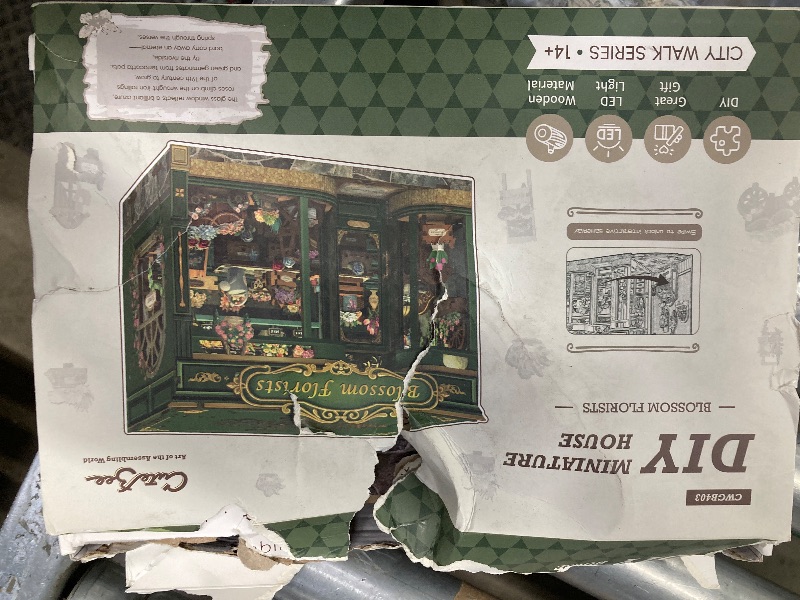 Photo 1 of ***NEW WITH DAMAGED PACKAGE***CUTEBEE Book Nook Kit - DIY Miniature House Dollhouse Kit for Adults and Teens, Booknook Tiny House Bookshelf Decor 3D Wooden Puzzle, Gifts for Family, Friends (Blossom Florists)