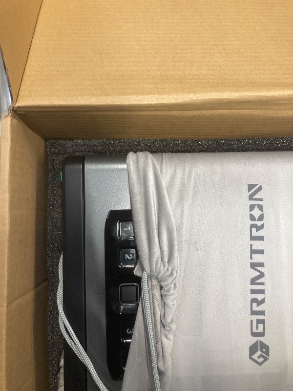 Photo 1 of Grimtron Biometric Gun Safe for Handgun, Smart Clock Safe with 2-in-1 Watch & Phone Wireless Charging, Bedside Pistol Safe with Backlit Keypad, Nightstand Handgun Safe with LED Light