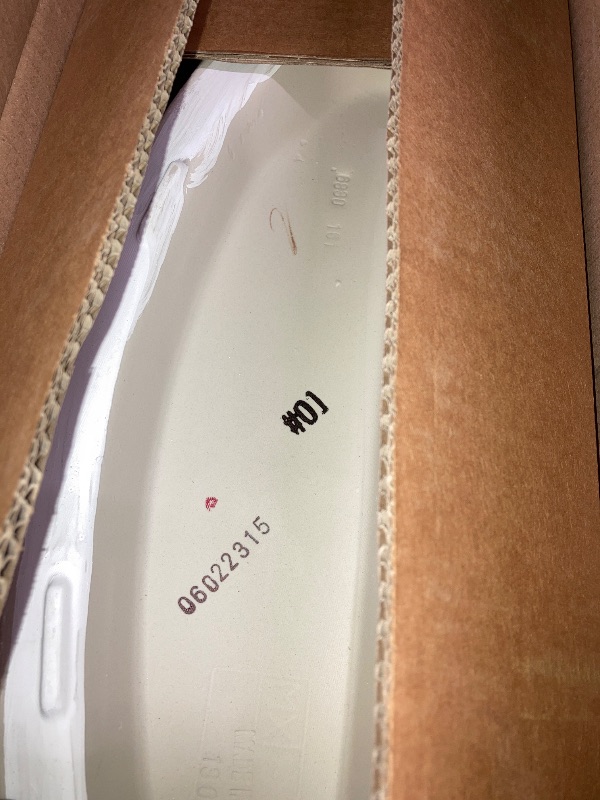 Photo 1 of Aquia IV Arc 2-Piece 0.9/1.28 GPF Dual Flush Elongated ADA Comfort Height Toilet in Cotton White SoftClose Seat Included