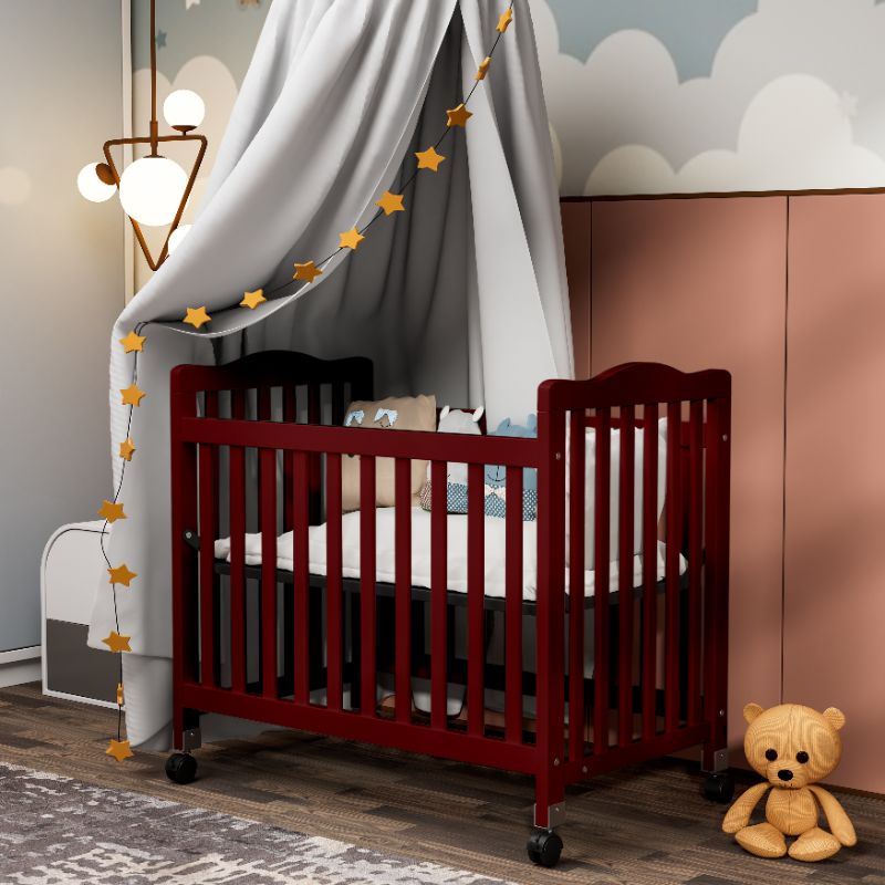 Photo 1 of Fizzy Baby Mini Crib, Small Crib with 3-Position Mattress Board, Cherry
