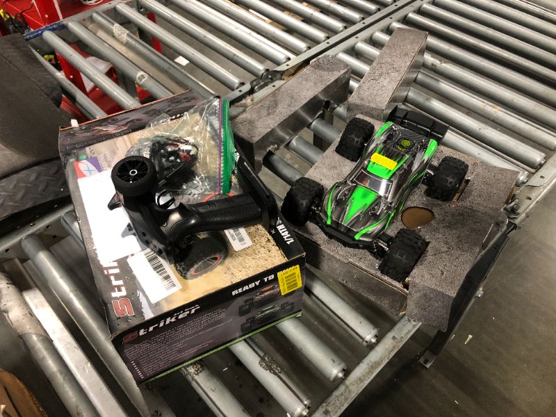 Photo 1 of ***Didn't see user manual. To turn on this item, open the body cover(pull 4 pins out before open) and connect the battery cord, on the side of suspension has a red button to press hold turn on, remote need 2 pack of 1.5V AA batteries, can't drive reverse 