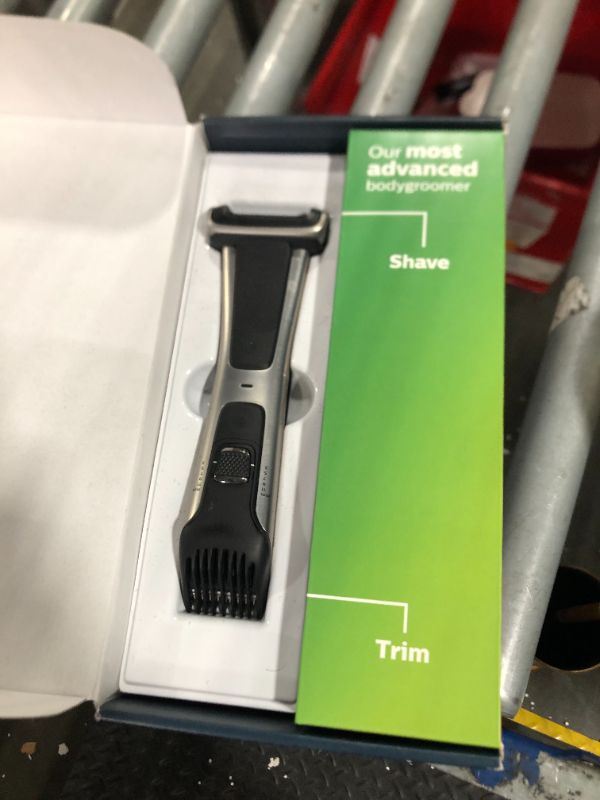 Photo 3 of **** NEEDS TO BE CLEANED**** Philips Norelco Bodygroom 7000 Series, Showerproof Groin and Body Trimmer for Men, Precise Body Grooming, Adjustable Comb, Safe Even Below The Belt, 80 Min. Runtime, Model BG7030/49