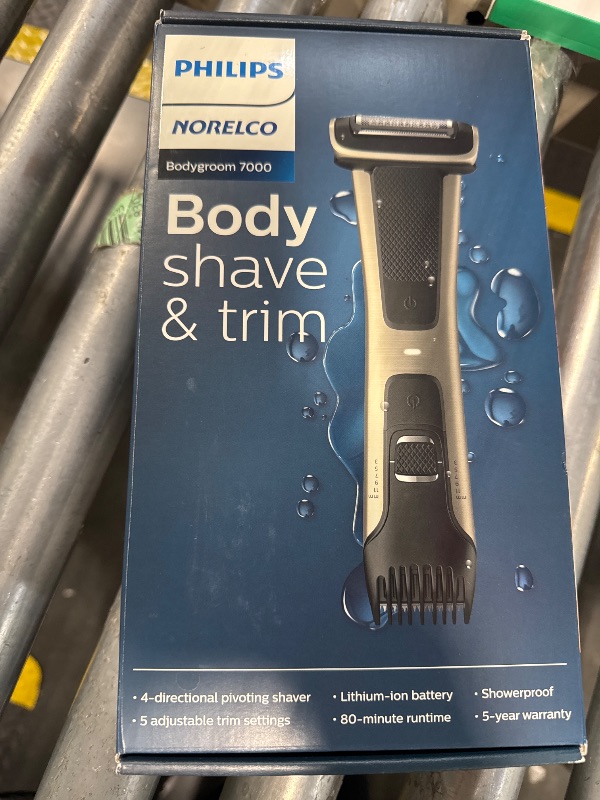 Photo 2 of **** NEEDS TO BE CLEANED**** Philips Norelco Bodygroom 7000 Series, Showerproof Groin and Body Trimmer for Men, Precise Body Grooming, Adjustable Comb, Safe Even Below The Belt, 80 Min. Runtime, Model BG7030/49