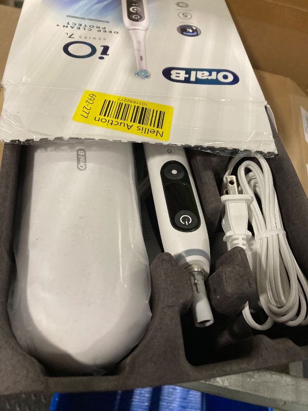 Photo 3 of ***FINAL SALE, NO RETURNS, PARTS ONLY***Oral-B iO Deep Clean + Protect Rechargeable Electric Toothbrush, White with a iO Series 7 Toothbrush, 2 Replacement Brush Heads, and a Charging Travel Case