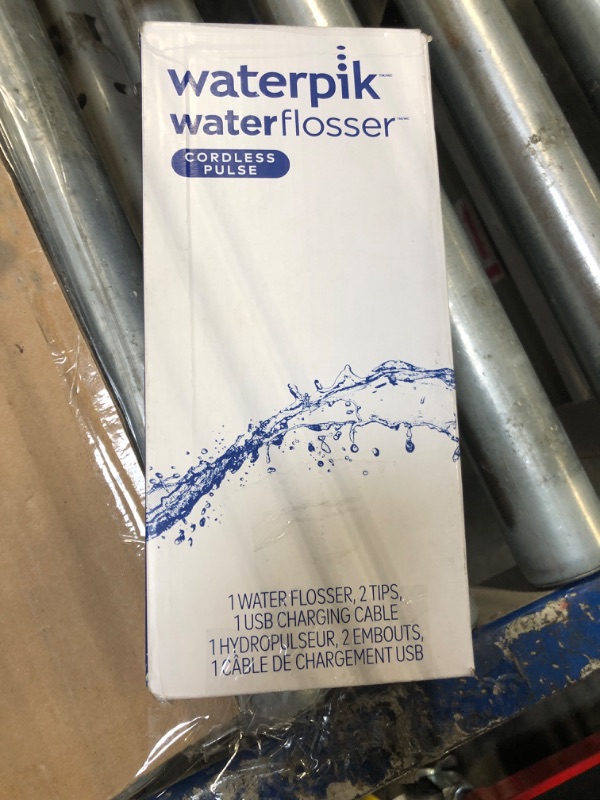 Photo 2 of **BASE AND CHARGER ONLY** Waterpik Cordless Pulse Rechargeable Portable Water Flosser for Teeth, Gums, Braces Care and Travel with 2 Flossing Tips, Waterproof, ADA Accepted, WF-20 White, Packaging May Vary