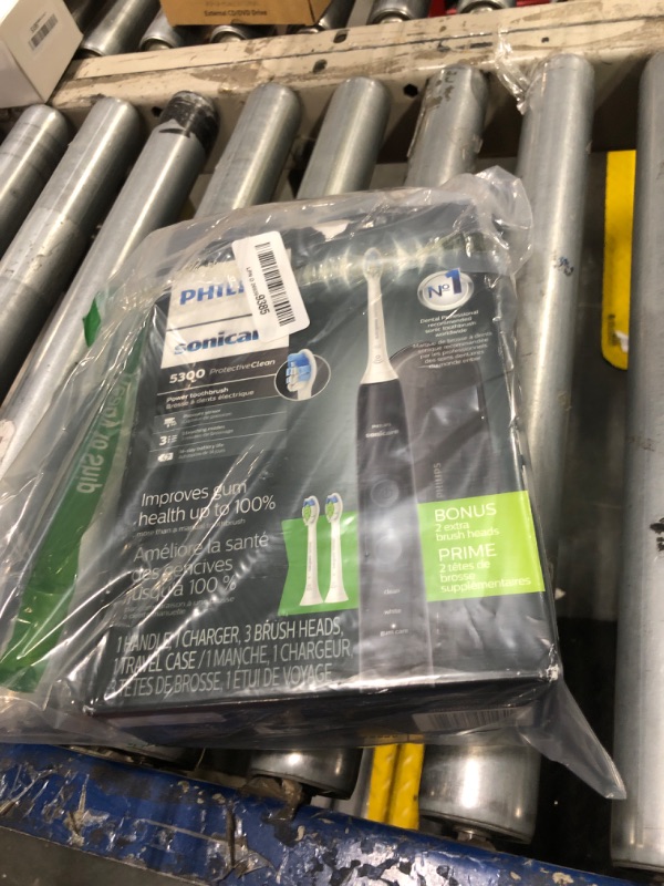 Photo 1 of Philips Sonicare ProtectiveClean 5300 Rechargeable Electric Toothbrush, with Pressure Sensor, 3 Cleaning Modes, SmarTimer and QuadPacer, with 2 Bonus Brush Heads, Travel Case, Black, Model HX6423/34