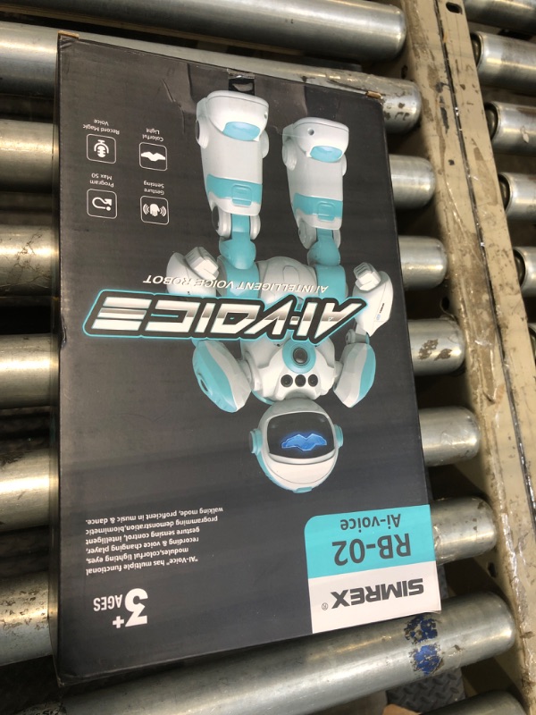 Photo 1 of SIMREX Kids Robot Toys, Remote Control Robot, Programmable Robot with Recorded Voice Music Dance Gesture Control, Gift for Toddler Boys and Girls