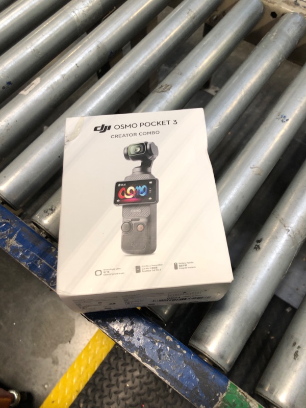 Photo 1 of DJI Osmo Pocket 3 Creator Combo, Vlogging Camera with 1'' CMOS, 4K/120fps Video, 3-Axis Stabilization, Face/Object Tracking, Fast Focusing, Mic Included for Clear Sound, Digital Camera for Photography