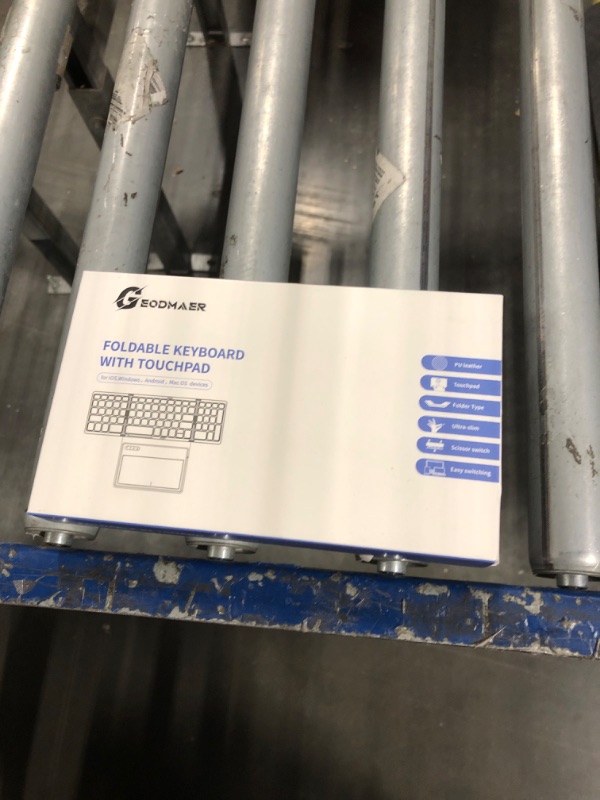 Photo 1 of GEODMAER Foldable Bluetooth Keyboard, Portable Full Size Folding Keyboard with Large Touchpad, Numeric Keypad, PU Leather, Wireless Travel Keyboard for Windows iOS Android Mac(Grey)