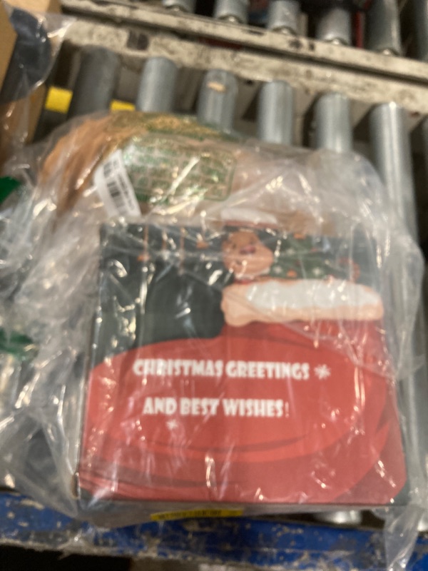 Photo 1 of Liooty Christmas Inflatables 6 Ft Gingerbread Man with Gift Bag and Candy Cane, LED Lights Blow up Xmas Decorations for Indoor Outdoor Yard Garden Lawn Holiday Party Decor