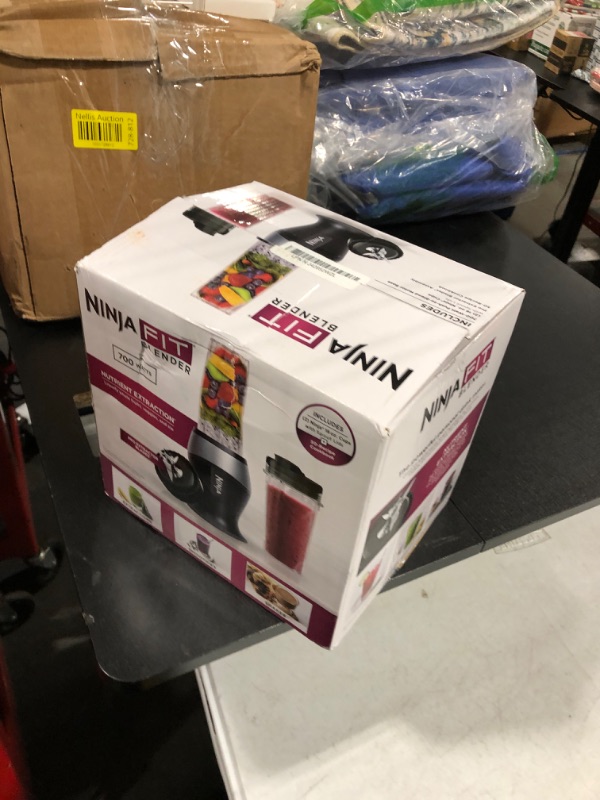 Photo 1 of Ninja Fit Compact Personal Blender, Portable Blender for-Smoothies, Shakes, Food Prep, and Frozen Blending, 700-Watt Base, (2) 16-oz. Cups and Spout Lids, Black QB3001SS