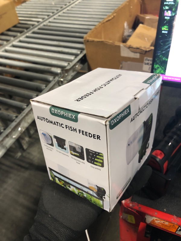 Photo 1 of DXOPHIEX WiFi Fish Feeder Automatic Fish Feeder Automatic Dispenser Vacation Fish Feeder for Aquarium and Turtle Tank with Fish Feeding Ring