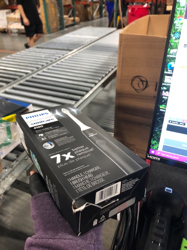 Photo 1 of Philips Sonicare 4100 Rechargeable Electric Toothbrush, with Pressure Sensor, 2 Intensity Settings, SmarTimer and QuadPacer, 14-Day Battery Life, Black, Model HX3681/24