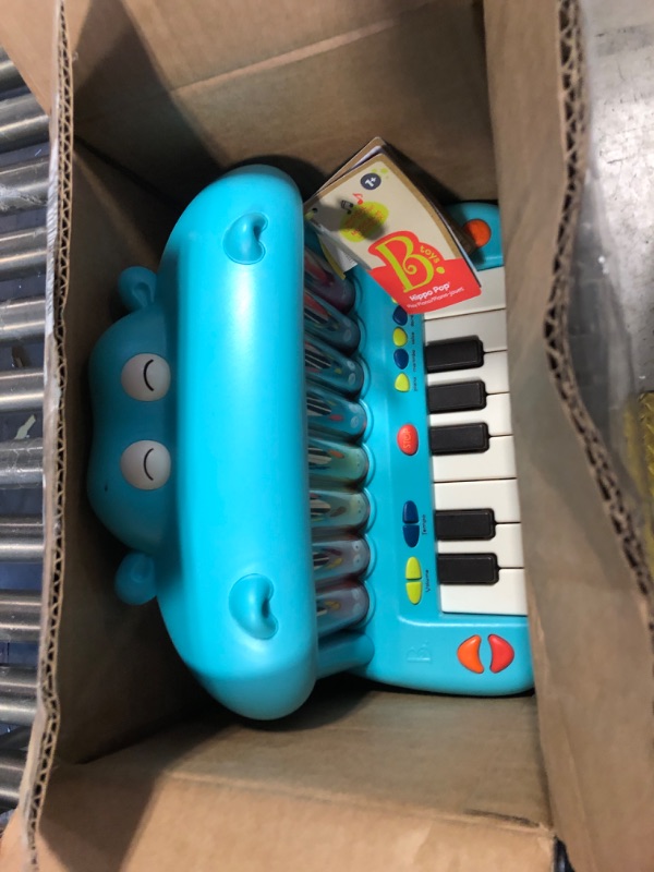 Photo 2 of B. toys- Hippo Pop- Musical Toy Keyboard – Play Piano – Songs, Sounds & Lights – Musical Instrument for Toddlers, Kids – 12 Months +