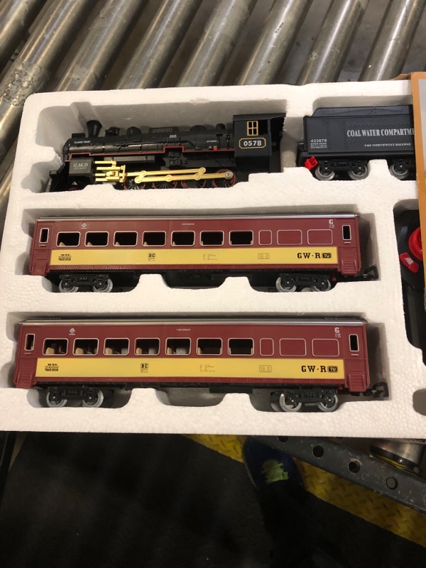 Photo 2 of Hot Bee Train Set for Boys,Remote Control Christmas Train Sets w/Steam Locomotive,Light Passenger Cars & Tracks,Trains Toys w/Smoke,Whistle & Lights,Christmas Toys Gifts for 3 4 5 6 7 8+ Year Old Kids