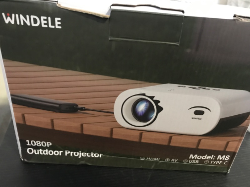 Photo 1 of Windele Upgraded 5G WiFi Bluetooth Projector, M8 Native 1080P Video Projector with USB-C Power Bank Compatibility, Portable Outdoor Projector with 84" Screen, Home Theater Mini Projector, Black& White