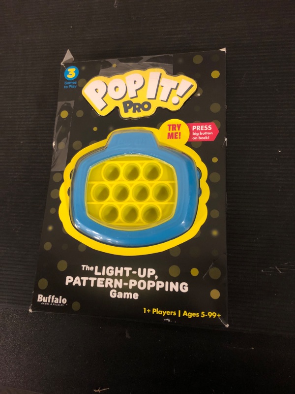 Photo 1 of Pop It! Pro - The Original Light Up, Pattern Popping, Pop It! Game from Buffalo Games,Blue and Yellow
