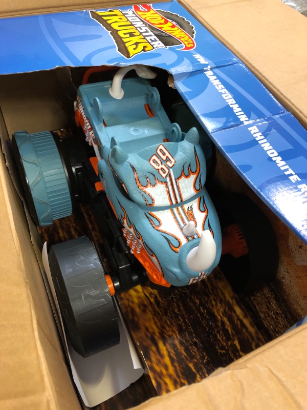 Photo 3 of Hot Wheels Monster Trucks RC Toy, Remote-Control Transforming Rhinomite in 1:12 Scale & 1:64 Scale Race Ace, Converts into Launcher, Connects to Track