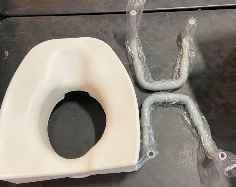 Photo 1 of Medline 5" Elongated Raised Toilet Seat, with Lock and Removable Padded Arms- A Medical Seat for Seniors, Elderly, Adults, or Post-Surgery Recovery, 1 Ct.