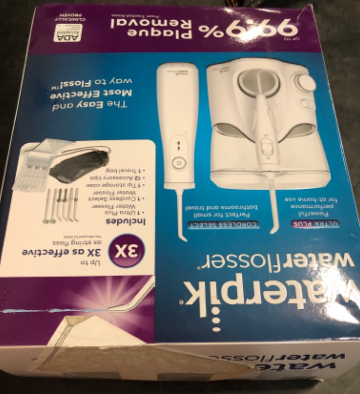 Photo 1 of USED Waterpik Ultra Plus and Cordless Pearl Water Flosser Combo Pack