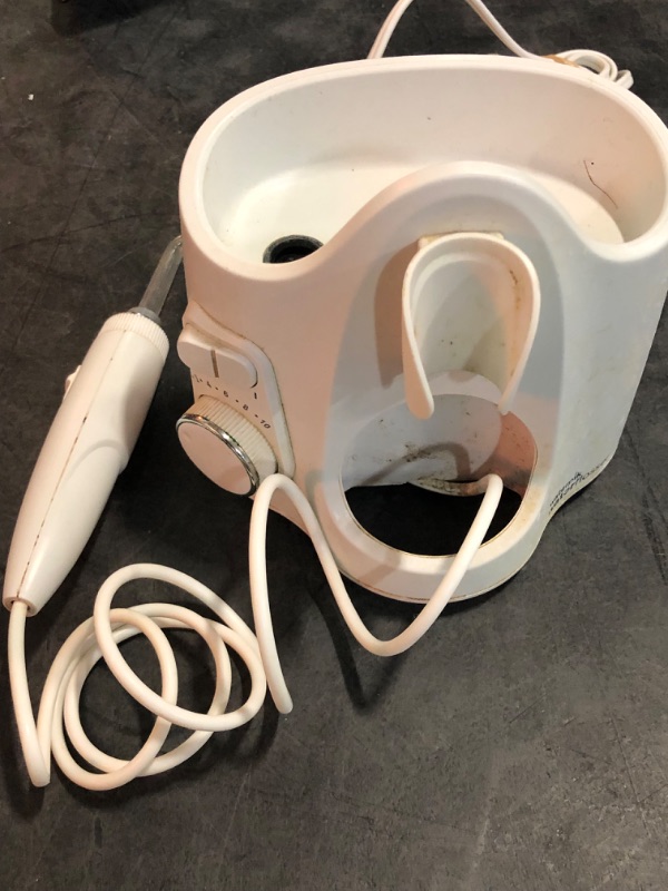 Photo 1 of USED Waterpik Ultra Plus and Cordless Pearl Water Flosser Combo Pack