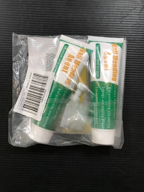 Photo 1 of GAXmi Wall Patches Spackle Set Drywall Repair Kit with 2 Pack Putty 4pcs 4" Patch Scraper Sandpaper for Filling Holes