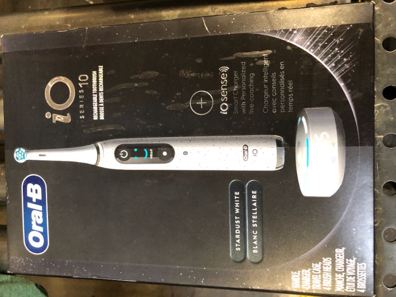 Photo 3 of Oral-B iO Series 10 Rechargeable Electric Toothbrush, Stardust White with 4 Brush Heads, Travel Case and iO Sense Charger - Visible Pressure Sensor to Protect Gums – 7 Cleaning Modes - 2 Minute Timer