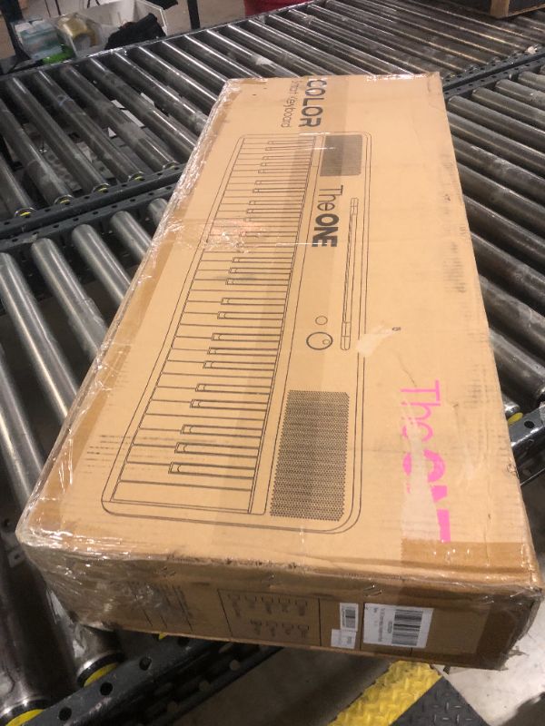 Photo 1 of The ONE Smart Keyboard COLOR 61 Lighted Keys Piano Keyboard, Electric Piano for Beginners with 256 Tones, 64 Polyphony, Built-in LED Lights & Apps, Supports USB MIDI/Headphones (Purple)