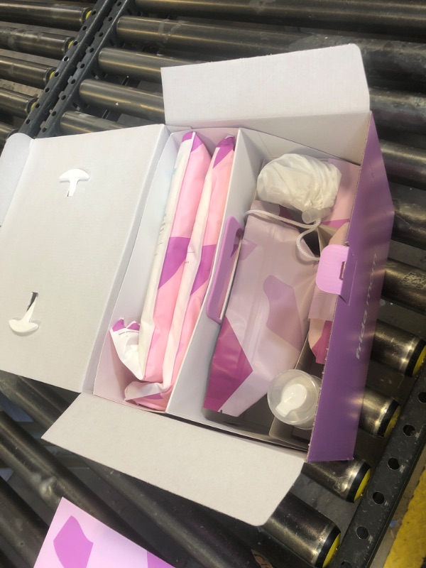 Photo 1 of Frida Mom Postpartum Recovery Essentials Kit, Includes Disposable Underwear, Instant Ice Maxi Pads, Perineal Healing Foam, Perineal Healing Pad Liners and Upside Down Peri Bottle (11pc Gift Set)