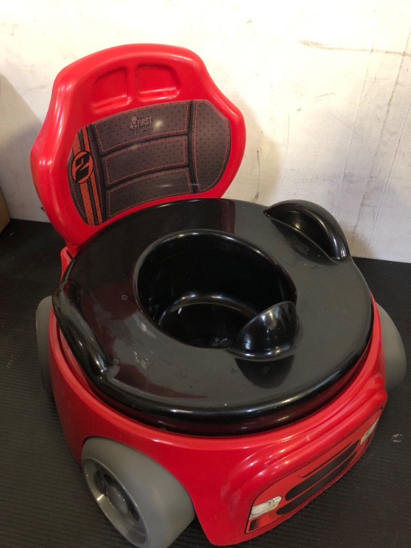 Photo 2 of The First Years Training Wheels Racer Potty System