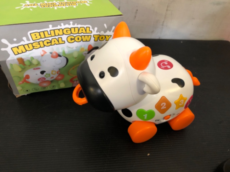 Photo 2 of Baby Toys 6-12-18 Month, Bilingual Musical Cow Toys for 1 Year Old Old Boy Girl, Crawling & Walking Infant Toy for 7 8 9-12-18 Month Developmental, First Christmas 1st Birthday Gift for 1 Year Old