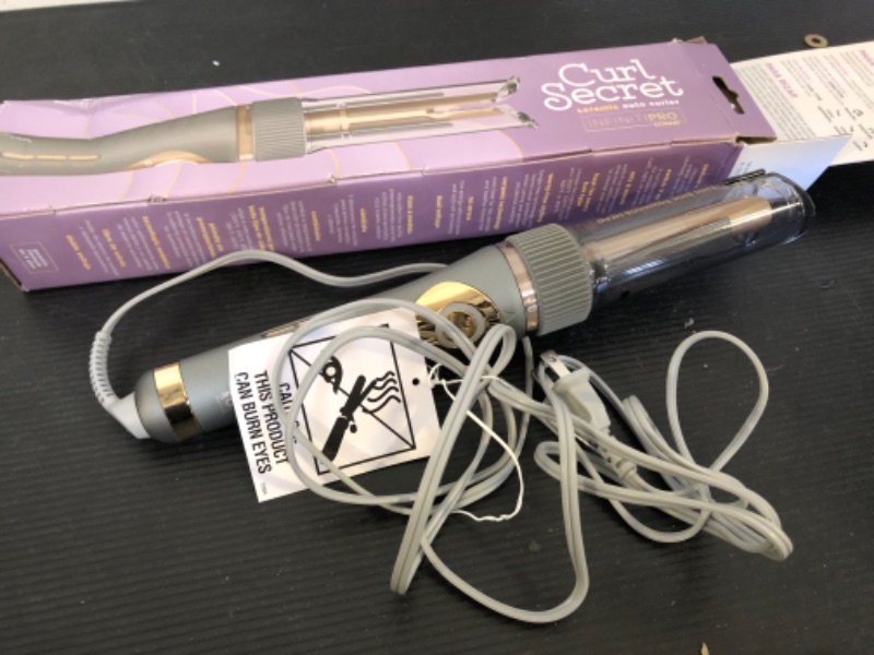 Photo 2 of INFINITIPRO by CONAIR New Curl Secret, Automatic Curling Iron with Dual Voltage for Worldwide Travel