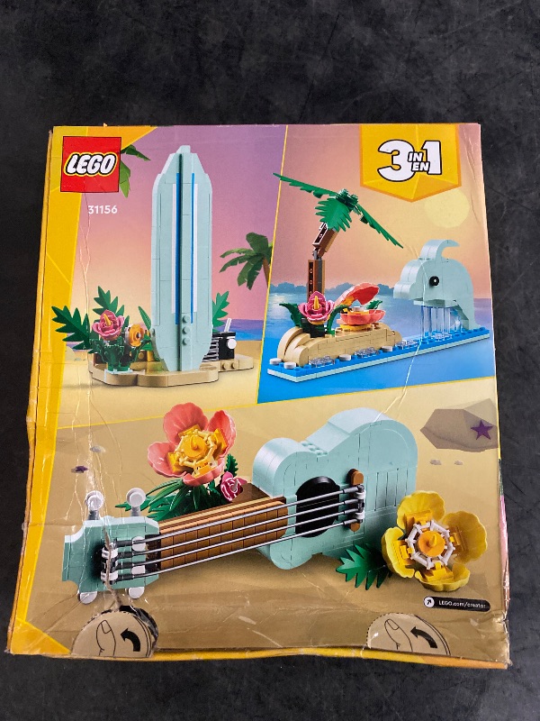 Photo 2 of LEGO Creator 3 in 1 Tropical Ukulele Instrument Toy Transforms from Ukulele to Surfboard Toy to Dolphin Toy Sea Animal Toy Beach