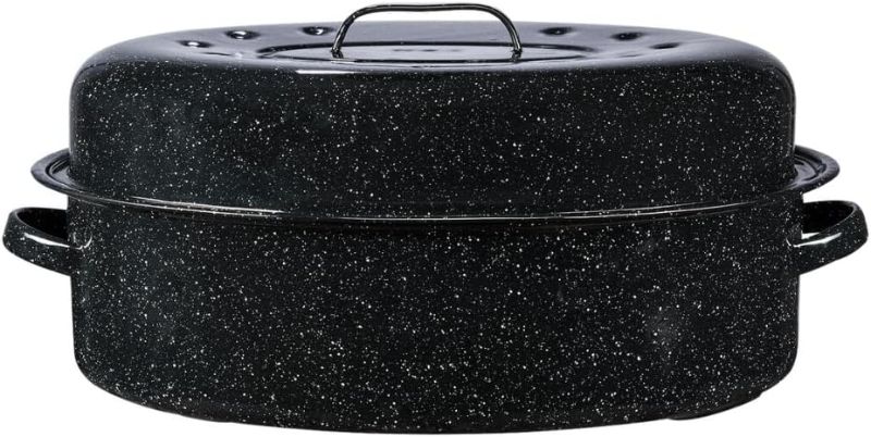 Photo 1 of Granite Ware 19 inch oval roaster with Lid enameled steel design to accommodate up to 20 lb poultry/roast. Resists up to 932°F