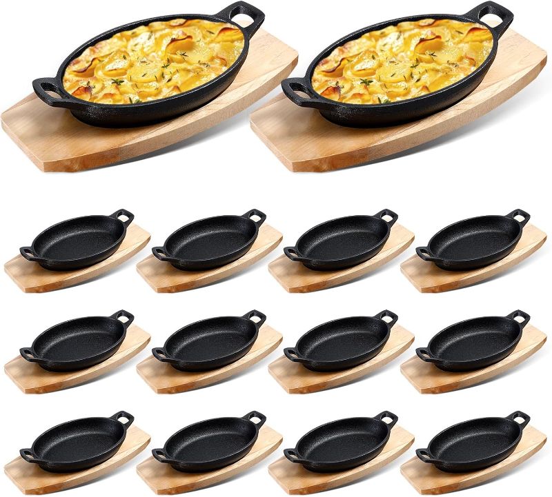 Photo 1 of Mifoci 12 Sets Cast Iron Skillet with Wooden Base Mini Cast Iron Fajita Plates Oval Dish Tray Serving Sizzling Plate Cast Iron Pan for Baking Roasting Cooking Kitchen Restaurant,8.7 x 4.7 x 1.6 Inch