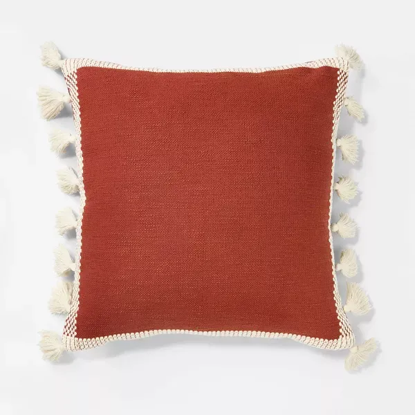 Photo 1 of Woven Frame Square Throw Pillow with Side Tassels