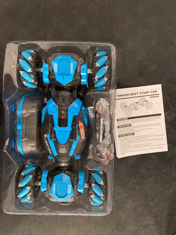 Photo 1 of Gesture Sensing RC Stunt Car for Boys, Remote Control Toys for Kids Age 5-7, 6-8, 9 10 11 12+ Years Old Birthday Gifts, 2.4GHz Hand Controlled RC Drift Car with Light & Music, Double-Sided Driving