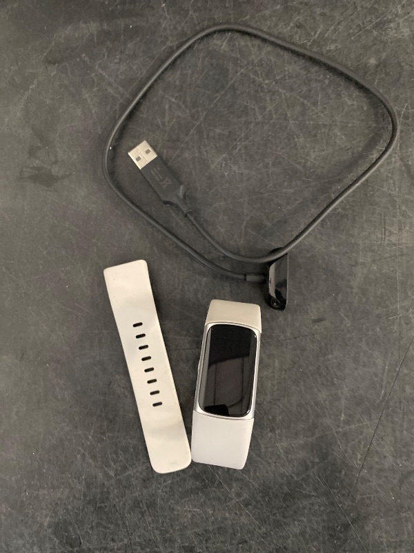 Photo 1 of Fitbit Charge 6 Fitness Tracker with Google apps, Heart Rate on Exercise Equipment, 6-Months Premium Membership Included, GPS, Health Tools and More, Porcelain/Silver, One Size (S & L Bands Included)