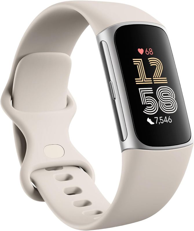 Photo 1 of Fitbit Charge 6 Fitness Tracker with Google apps, Heart Rate on Exercise Equipment, 6-Months Premium Membership Included, GPS, Health Tools and More, Porcelain/Silver, One Size (S & L Bands Included)