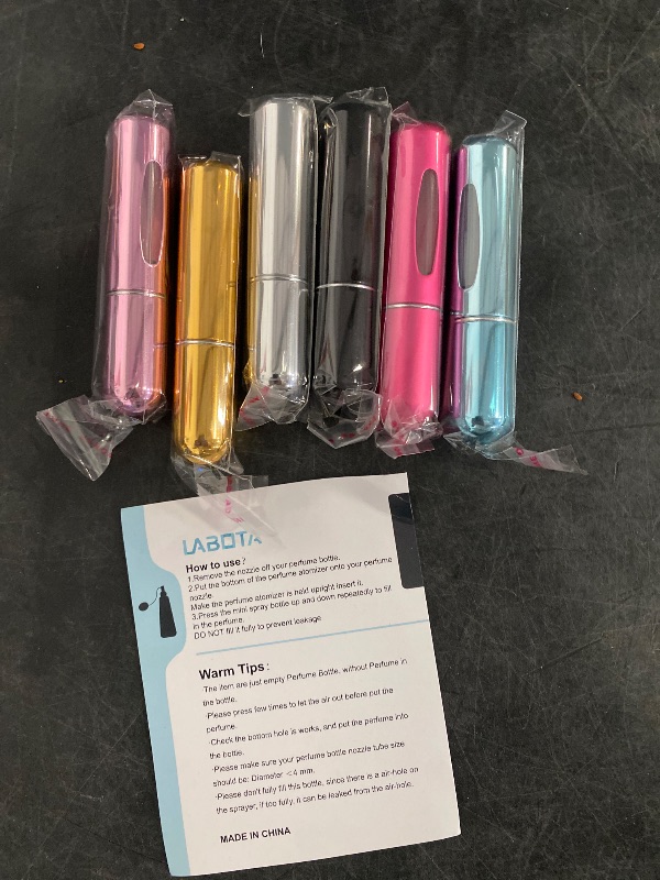 Photo 1 of Travel Perfume Atomizer 6 Pack Portable Mini Refillable Spray Bottle 5ml set for Perfumes and Fragrances, Convenient for Travel, Gym, Gifts, and Everyday Use