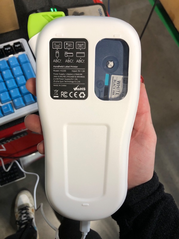 Photo 1 of (READ FULL POST) Vixic Label Maker Machine with-Tape, H1100 Handheld Label Maker Portable Labeler with Backlight Screen Keyboard for Home School Office Organization, Multiple Fonts Symbols Borders Easy to Use Inkless
