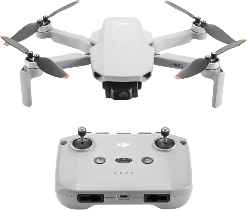 Photo 1 of **MISSING JOYSTICKS FOR CONTROLLER**
DJI - Mini 2 SE Drone with Remote Control - Gray
