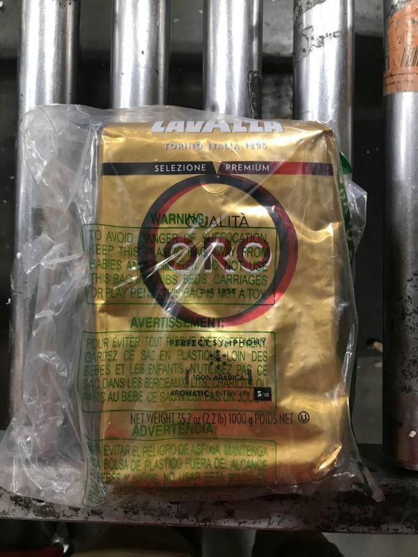 Photo 2 of Lavazza QualitÃ Oro Whole Bean Blend, Medium Roast, 2.2 Pound (Pack of 1) ,100% Arabica, Central America & African highland origins, Fruity & Aromatic BEST BY 09/30/2024