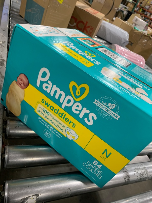 Photo 2 of Pampers Swaddlers Diapers Newborn - Size 0, 84 Count, Ultra Soft Disposable Baby Diapers Newborn 84