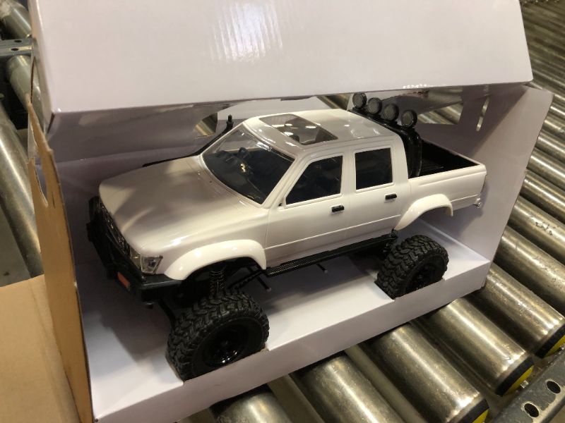 Photo 2 of captainrc 1:16 Scale RC Crawler RTR RC Rock Truck 4x4 2.4GHZ Hobby Grade Remote Control Car Model Vehicle RC Buggy with LED Light,2 Batteries