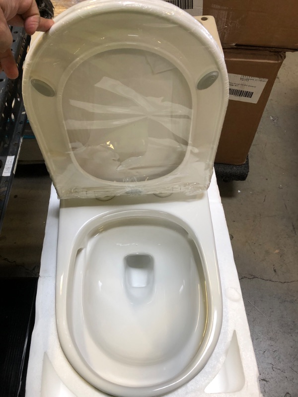 Photo 3 of  12 in. Rough in Size 1-Piece 1.1/1.6 GPF Dual Flush Elongated Toilet in White, Seat Included