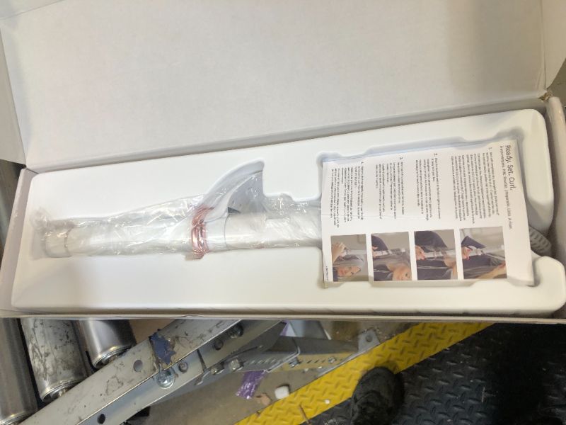 Photo 1 of T3 CurlWrap 1.25" Automatic Rotating Curling Iron with Long Barrel, 2 Timer Settings, 9 Heat Settings, Auto-Rotating Ceramic Barrel and Ion Generator for Fast, Easy Curls and Waves on All Hair Types