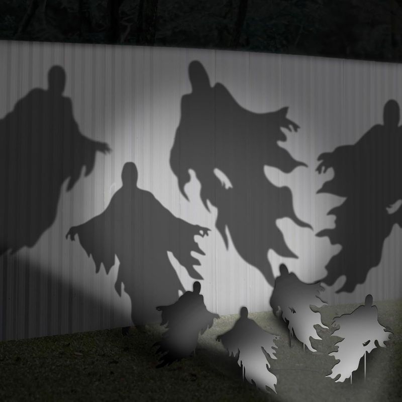 Photo 1 of Ohjijinn 4Pack Halloween Ghost Yard Signs with Stakes Scary Silhouette Outside Halloween Decorations Outdoor Lawn Garden Graveyard Decorations
